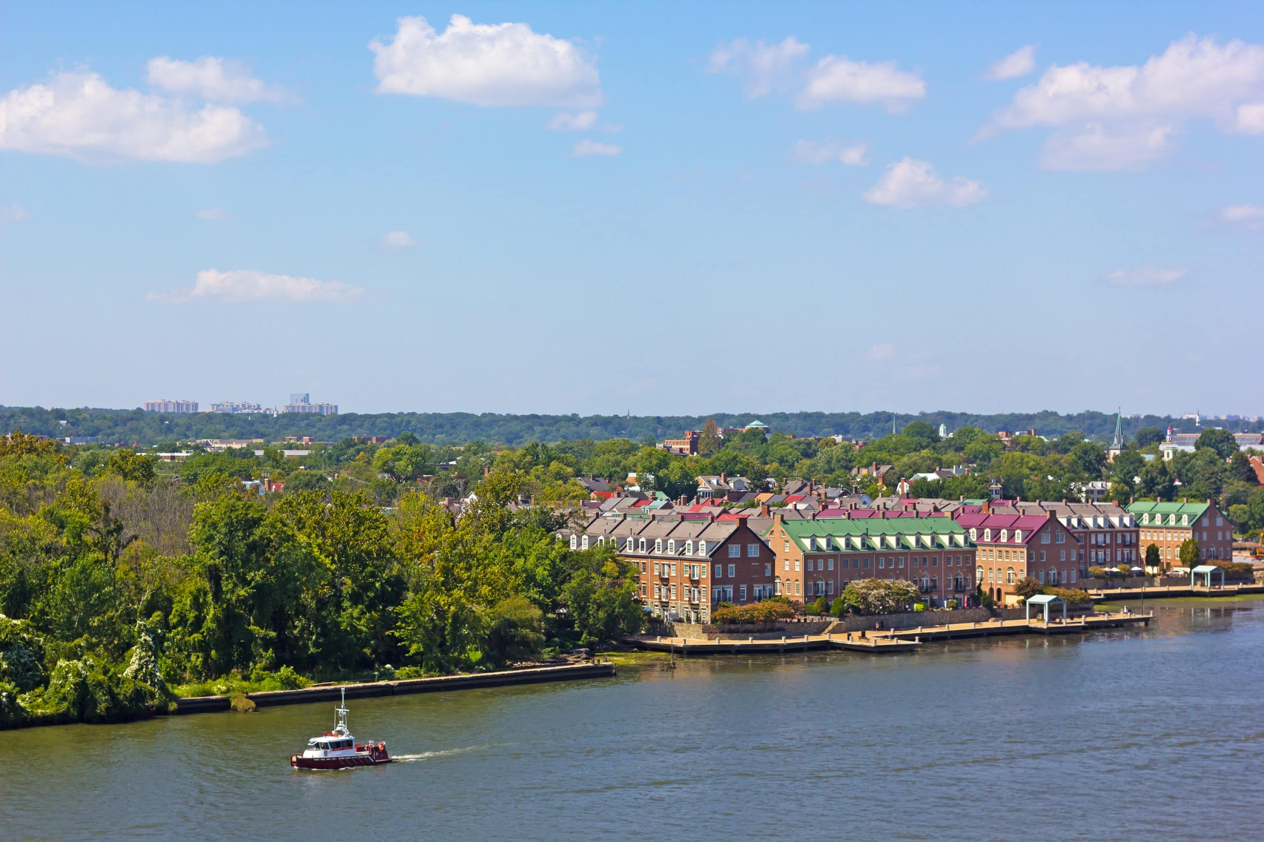 A river waterfront along the river of nationally designated historic district in early fall.