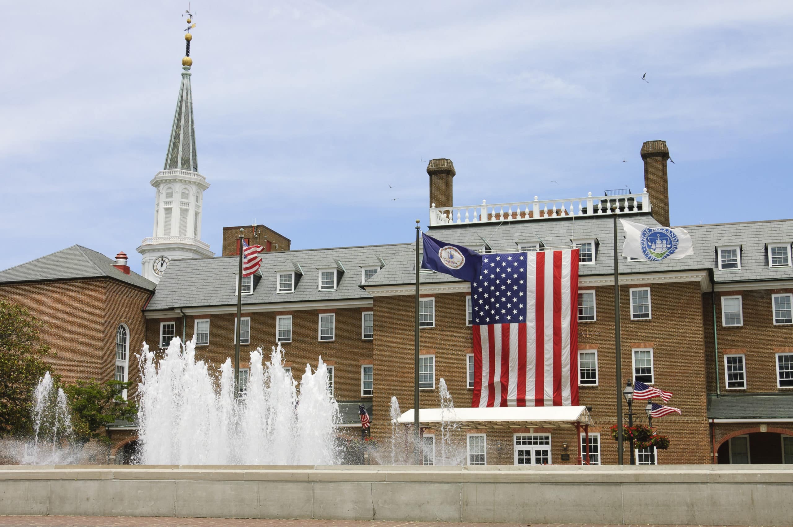 City hall front view and the largest  American flag ever seen in Alexandria city, Virginia, USA